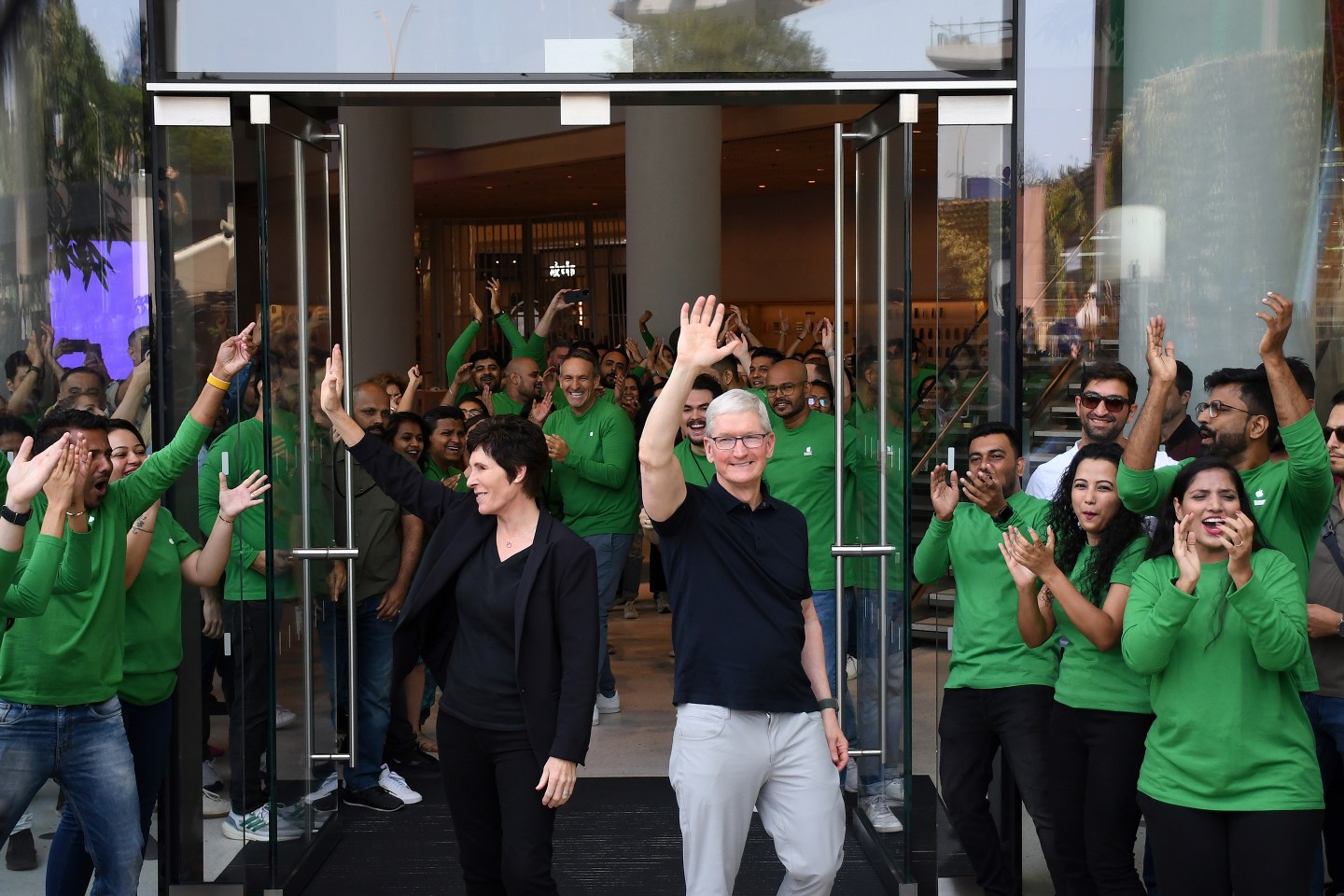 Apple’s senior vice president of retail, Deirdre O’Brien, and CEO Tim Cook at the opening of the Mumbai store in April 2023.