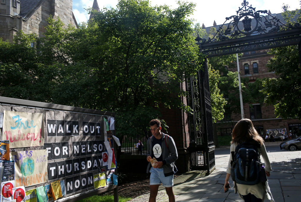 Students walk through Yale University, as seen in September 2018, in New Haven, Conn. (Photo by Yana Paskova/Getty Images)