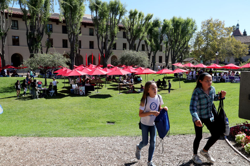 Girls walk around during the World Wide Women Girls' Festival at Santa Clara University in Santa Clara, California, as seen in October 2018. (Ray Chavez—Digital First Media/The Mercury News/Getty Images)