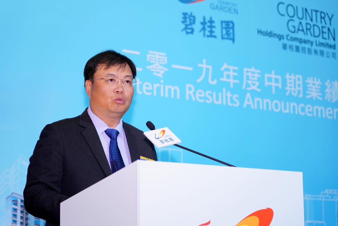 Mo Bin, president of Country Garden Holdings, attends the company’s 2019 interim results announcement in Hong Kong in August 2019. Mo and three other executives took pay cuts according to a filing on the Hong Kong stock exchange on Dec. 12, 2023.