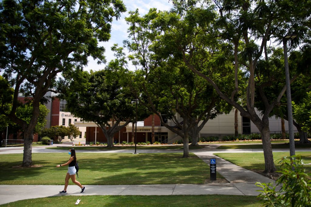 A person walks on the California State University Long Beach (CSULB) campus, as seen in August 2021 in Long Beach, California. (Photo by PATRICK T. FALLON—AFP/Getty Images)