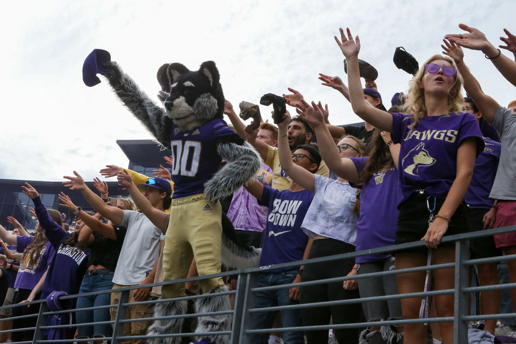 Washington Huskies mascot Harry the Husky stands with the student section before a college football game between the Montana Grizzlies and the Washington Huskies, as seen in September 2021, at Husky Stadium in Seattle. (Photo by Jacob Snow—Icon Sportswire/Getty Images)