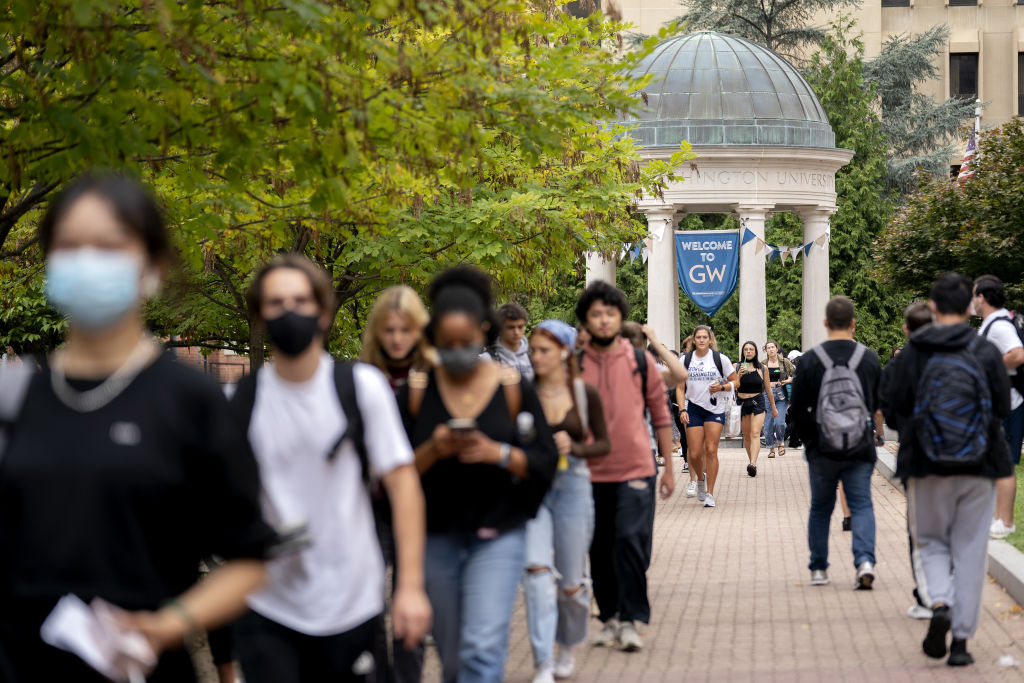Students on campus at George Washington University in Washington, D.C., as seen in September 2021. (Photographer: Stefani Reynolds—Bloomberg/Getty Images)