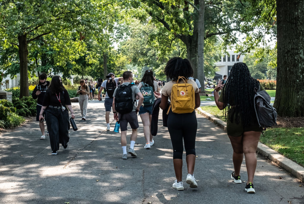 Students on campus at the American University in Washington, D.C., U.S., as seen in September 2021. (Photographer: Dee Dwyer—Bloomberg/Getty Images)