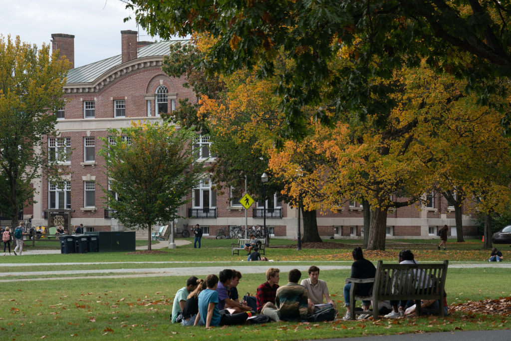 Students have class outdoors on the campus of Dartmouth College in Hanover, New Hampshire, as seen in October 2021. (Photographer: Bing Guan—Bloomberg/Getty Images)