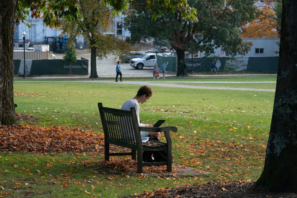 A student uses a laptop computer on the campus of Dartmouth College, as seen in October 2021. (Photographer: Bing Guan—Bloomberg/Getty Images)