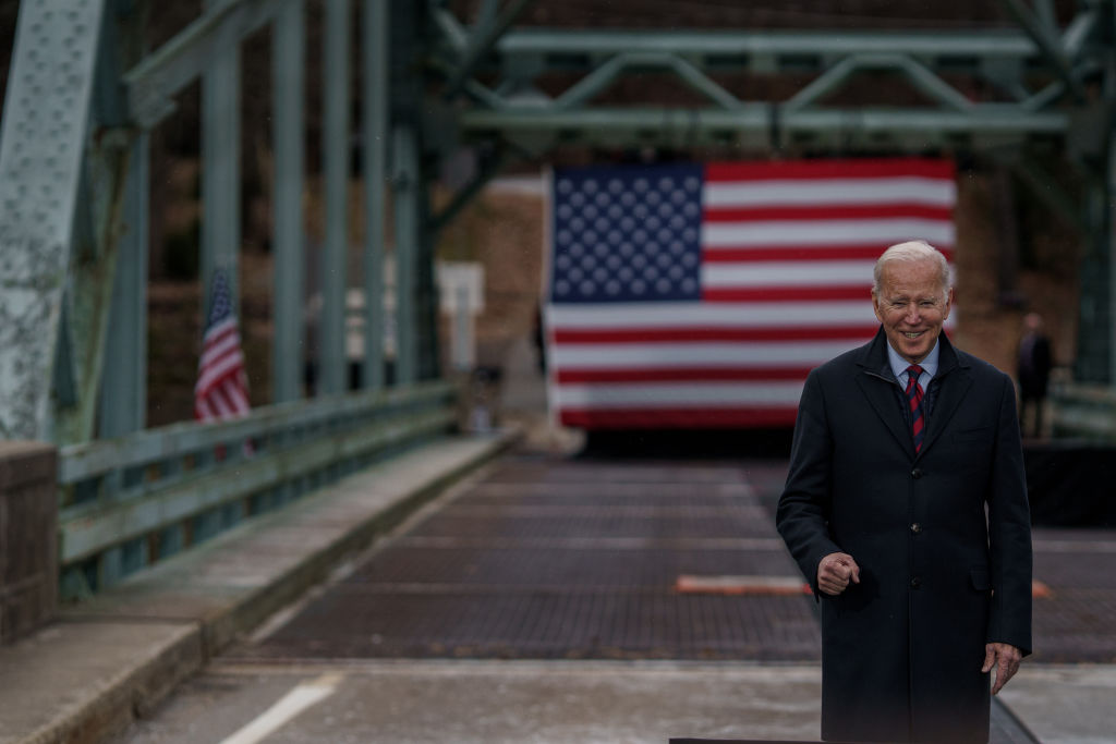 U.S. President Joe Biden visits a bridge along NH 175 spanning the Pemigewasset River, as seen in November 2021. (Photo by John Tully/Getty Images)