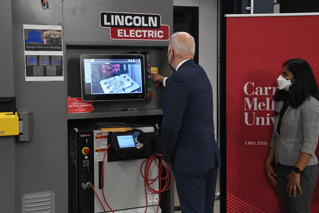 U.S. President Joe Biden tours Carnegie Mellon University at Mill 19 in Pittsburgh, Pennsylvania, as seen in January 2022. (Photo by SAUL LOEB—AFP/Getty Images)