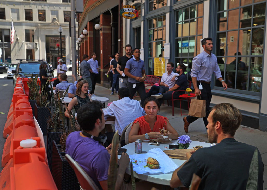 Lunch at some of the Water Street Boston restaurants, as seen in August 2022. (Photo by David L. Ryan—The Boston Globe/Getty Images)