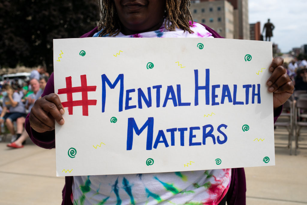 At the Community Mental Health Association of Michigan “Walk a Mile in My Shoes” rally in Lansing, Mich., in September 2022. (Photographer: Emily Elconin—Bloomberg/Getty Images)