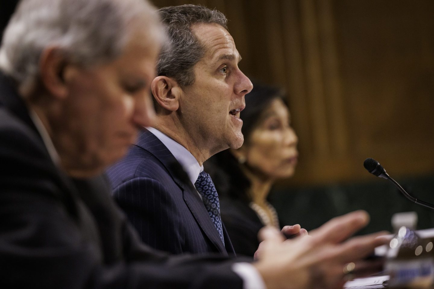 Michael Barr, vice chair for supervision at the U.S. Federal Reserve, speaks during a Senate Banking, Housing, and Urban Affairs Committee hearing with Martin Gruenberg, chairman of the Federal Deposit Insurance Corp., left, and Nellie Liang, under secretary for domestic finance at the U.S. Treasury, right, on Mar. 28. Congressional committees' probing the collapse of Silicon Valley Bank and Signature Bank heralded a clash over the role of financial regulations in the second-largest bank failure in U.S. history.