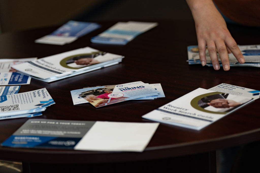 Flyers at a career fair hosted by the New Hanover NCWorks and the Cape Fear Workforce Development Board in Wilmington, North Carolina, as seen in June 2023. (Photo by Allison Joyce—Bloomberg/Getty Images)