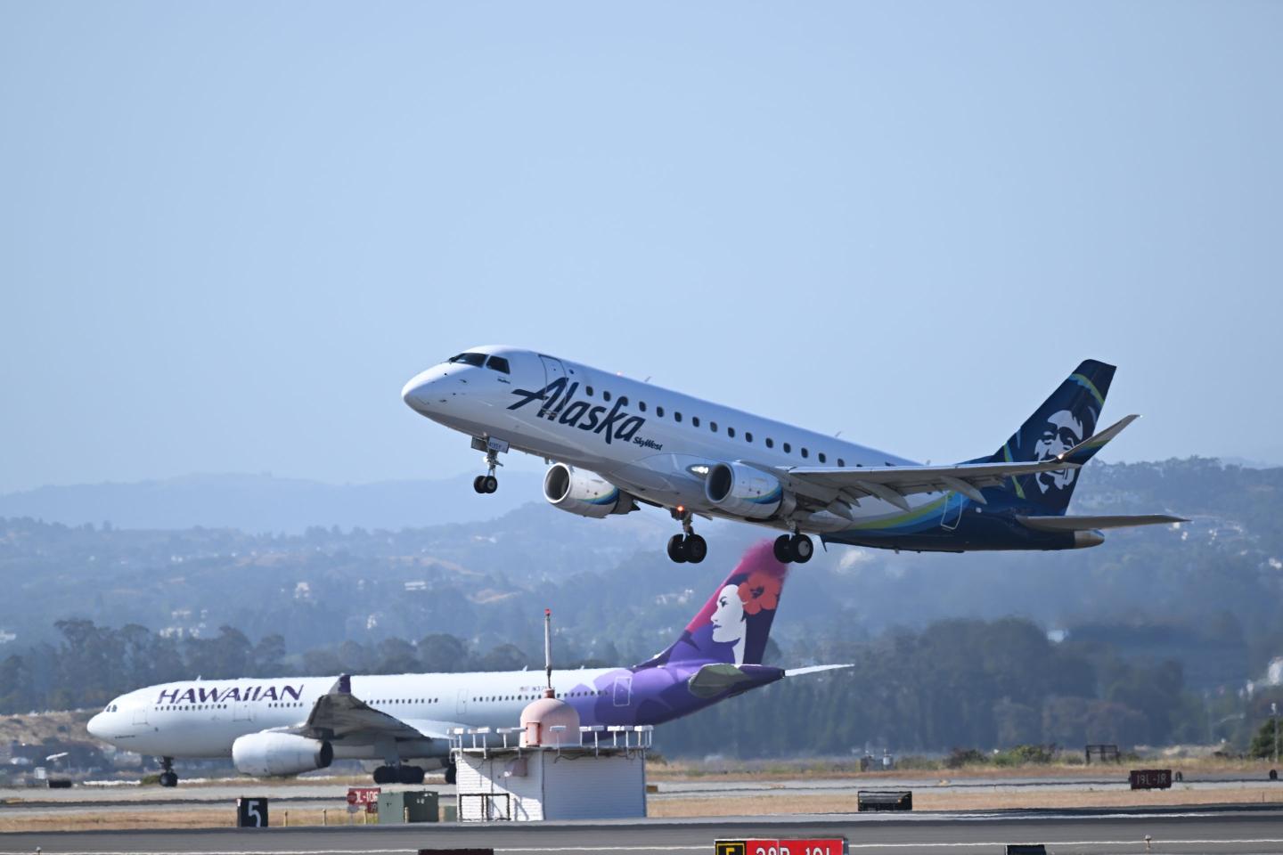 Alaska Air agrees to buy struggling Hawaiian Airlines in a $1.9 billion deal
