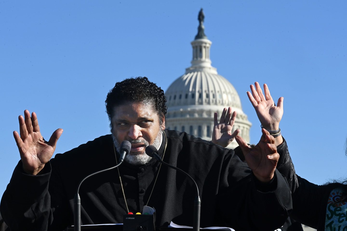 Rev. William Barber II, leader of the Poor People's Campaign, speaks at a rally in Washington, D.C., on Dec. 13, 2021.