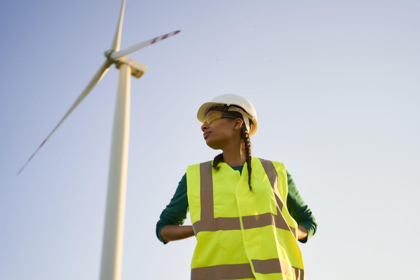 Photo of a wind turbine service technician on the job