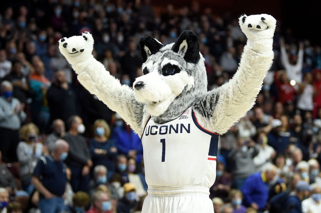 The Connecticut Huskies mascot performs during the game against the Louisville Cardinals in the Basketball Hall of Fame Women's Showcase, as seen in December 2021. (Photo by G Fiume/Getty Images)