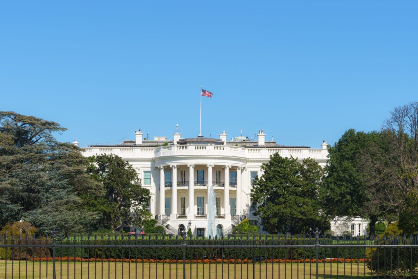 White House on deep blue sky background in Washington DC, USA.