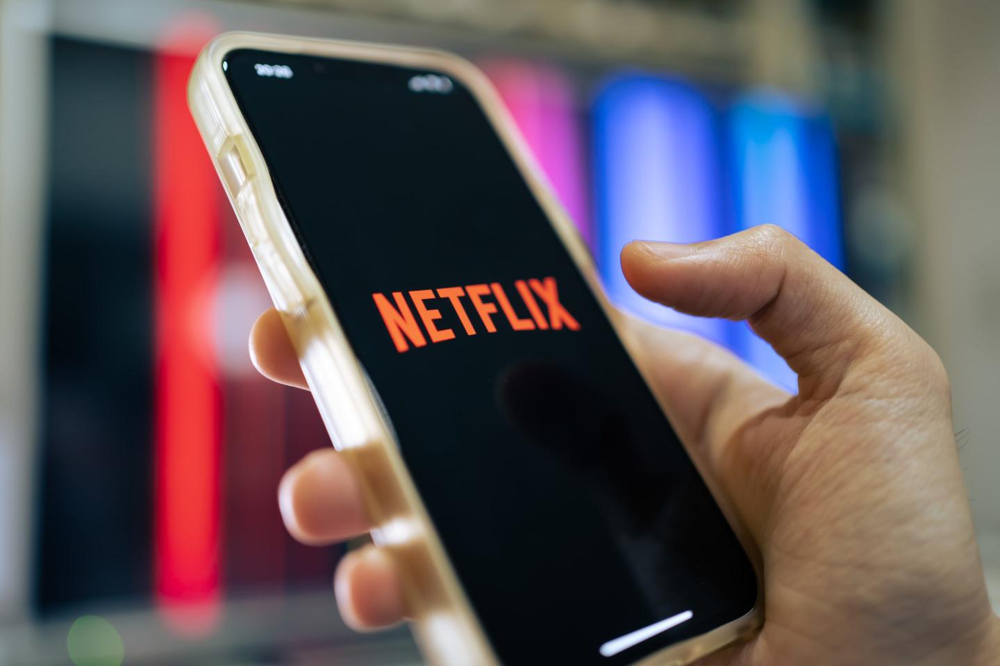 iPhone 13 showing its screen with Netflix application