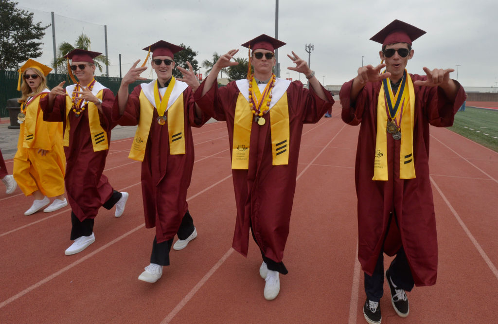 Wilson High School seniors enter their graduation ceremony at Veterans Memorial Stadium in Long Beach, as seen in June 2023. (Photo by Brittany Murray—MediaNews Group/Long Beach Press-Telegram/Getty Images)