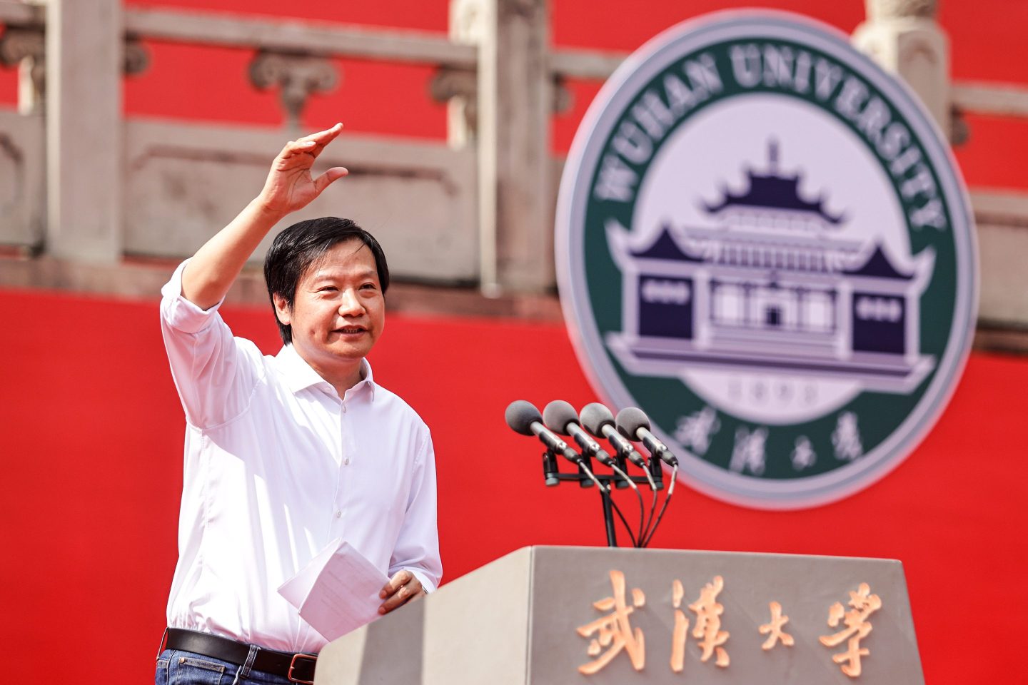 Xiaomi's founder Lei Jun delivers a speech during a graduation ceremony at Wuhan University on June 20, 2023.