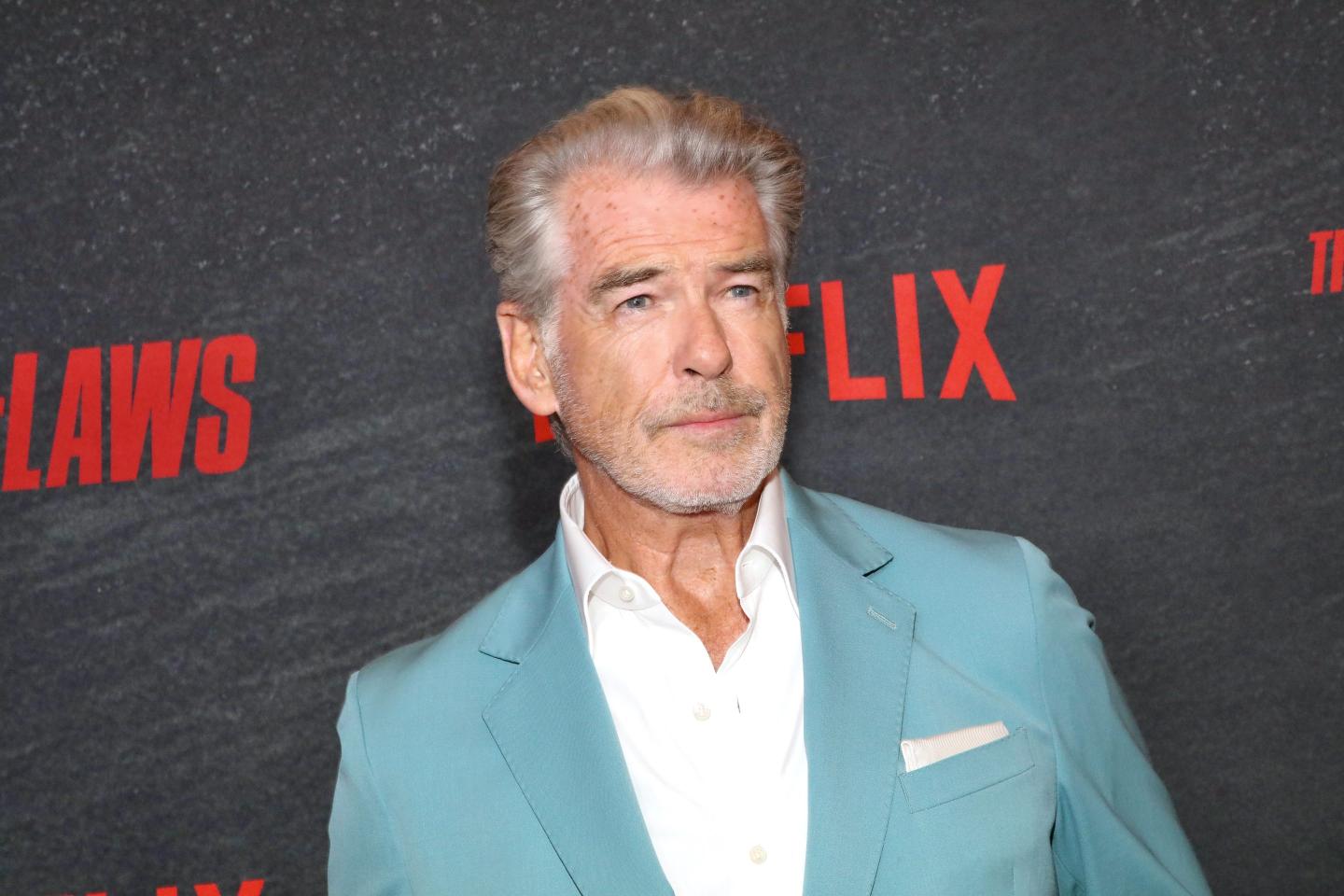 Actor Pierce Brosnan is cited for stepping out of bounds at a sensitive thermal area in Yellowstone