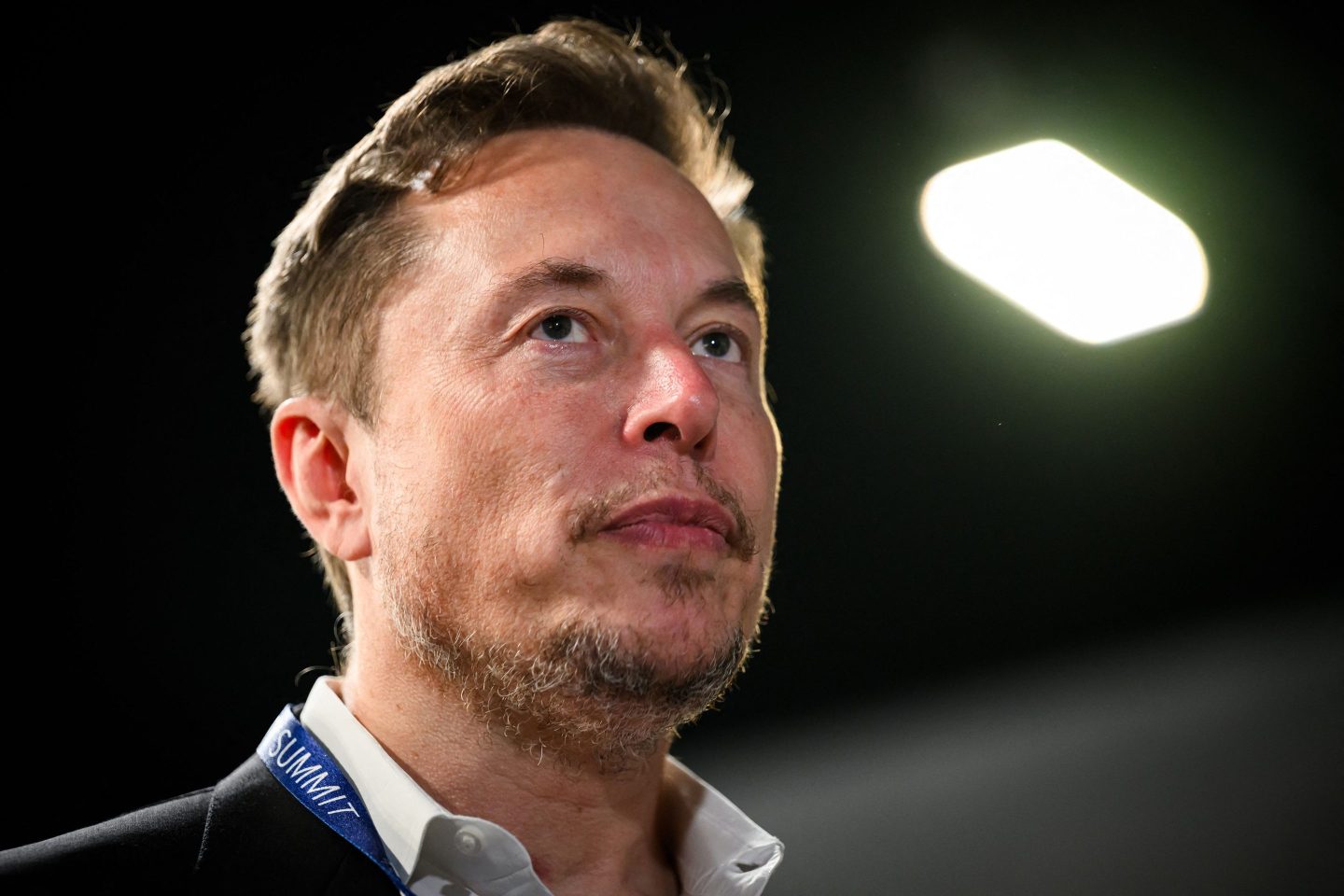 Elon Musk reacts during the UK Artificial Intelligence (AI) Safety Summit at Bletchley Park, in central England.