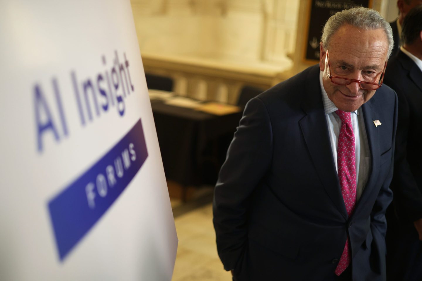 Sen. Chuck Schumer (D-N.Y.) one of the hosts of the Senate AI Insight Forums said drafting bipartisan, comprehensive legislation to regulate AI will be "exceedingly ambitious."