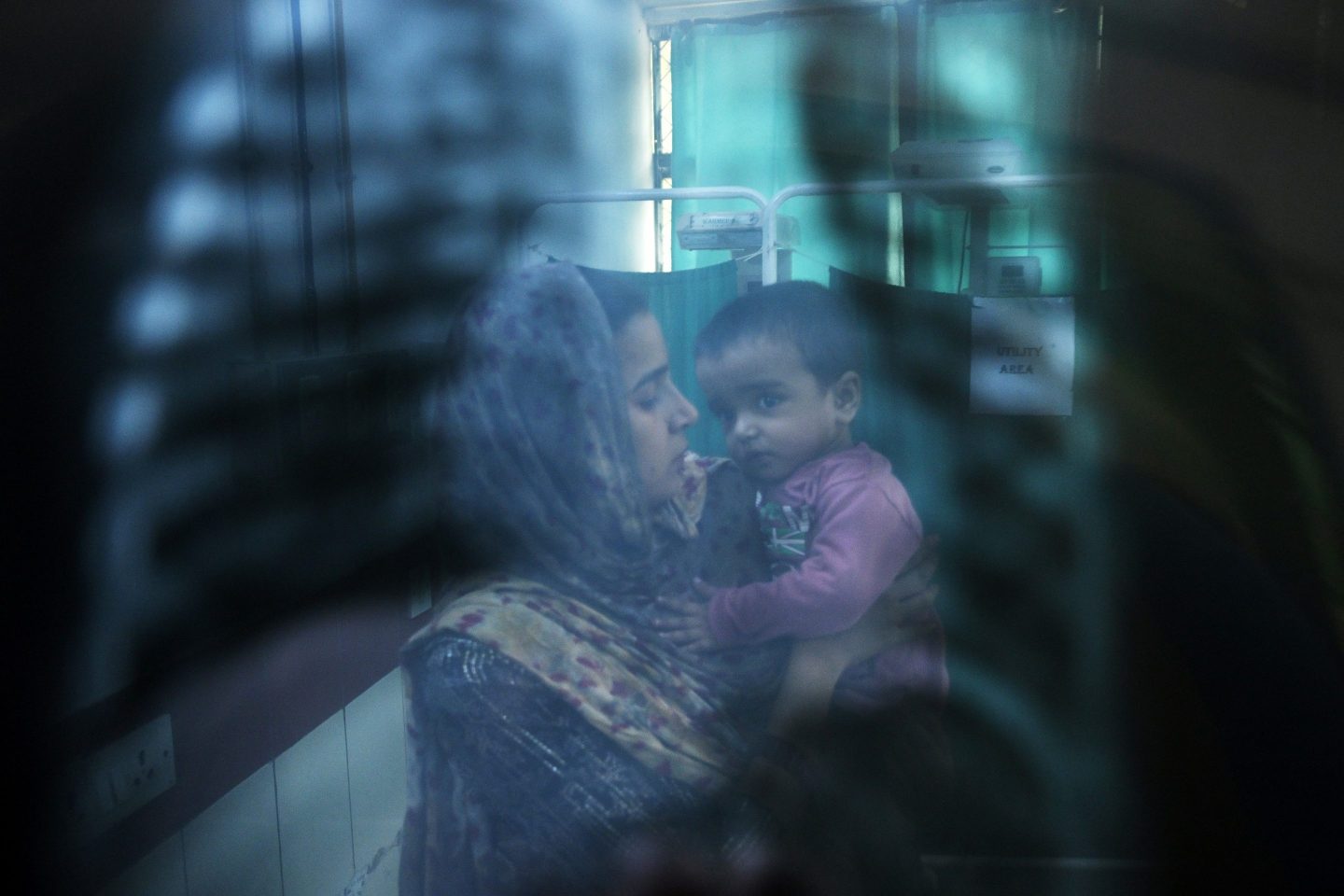 A doctor examines the X-ray of a child with breathing difficulties at the emergency ward of Chacha Nehru Bal Chikitsalaya children's hospital in New Delhi. Increased reports of pneumonia in many countries, including "white lung" pneumonia in U.S. children, have some parents worried. But "white lung" pneumonia isn't a medical term, experts say.