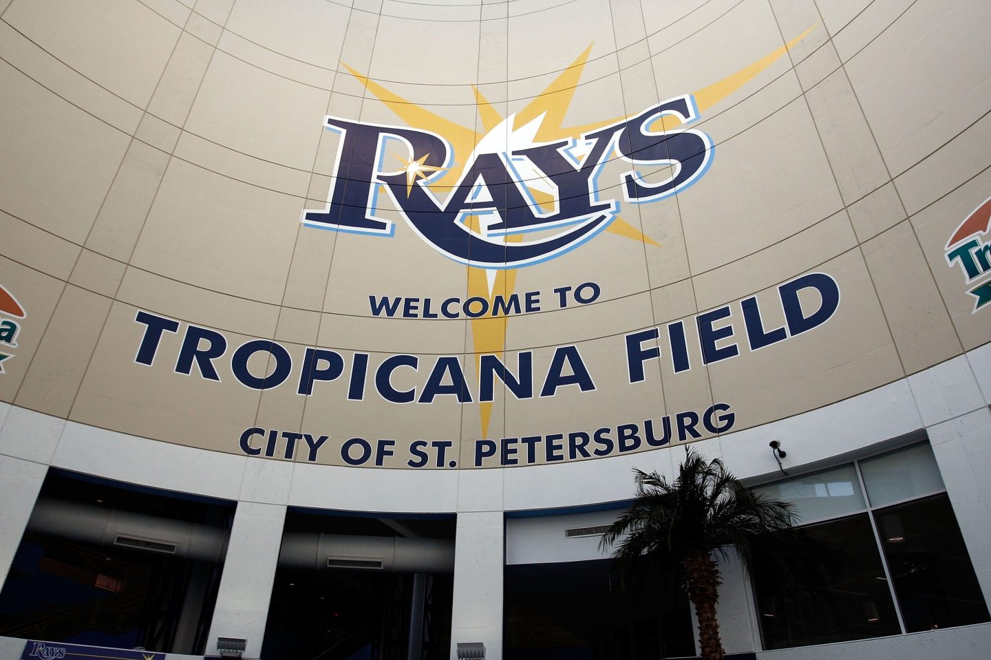 Sign at stadium reads "Rays. Welcome to Tropicana Field. City of St. Petersburg"