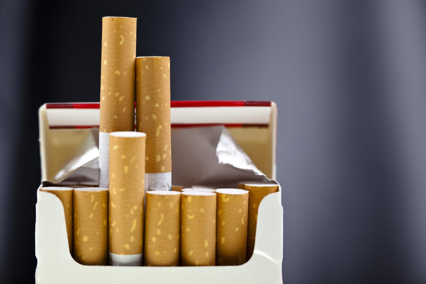 An up close view of a package of several cigarettes