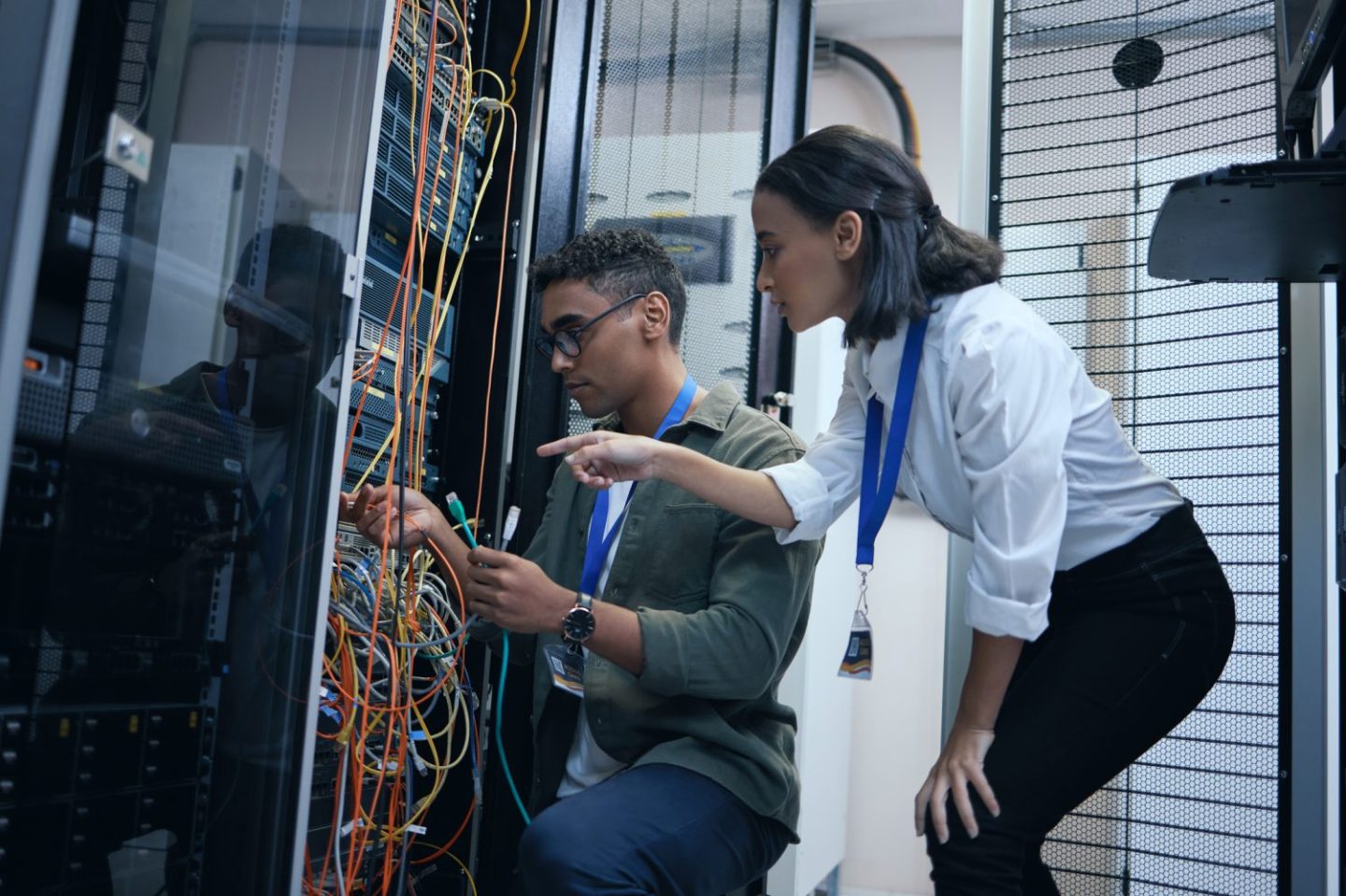 Two technicians work on cloud server