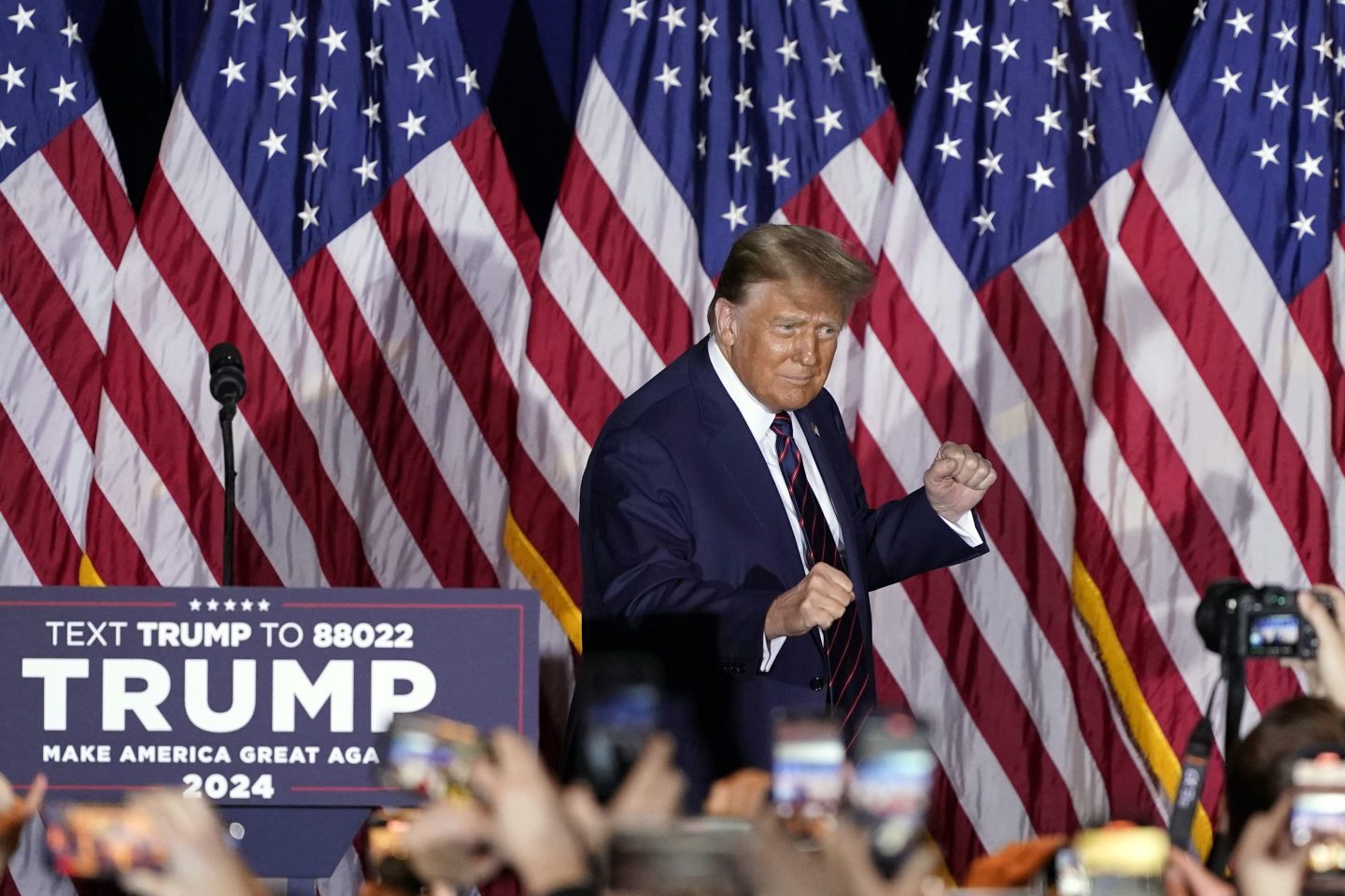 Republican presidential candidate former President Donald Trump arrives to speak at a primary election night party in Nashua, N.H., on Jan. 23, 2024.