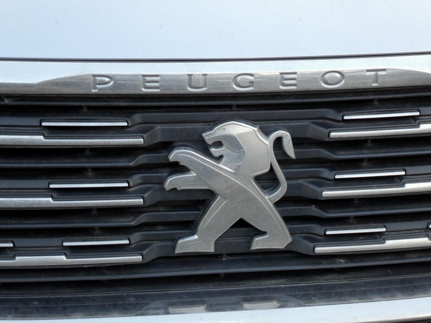 Peugeot logo on a car