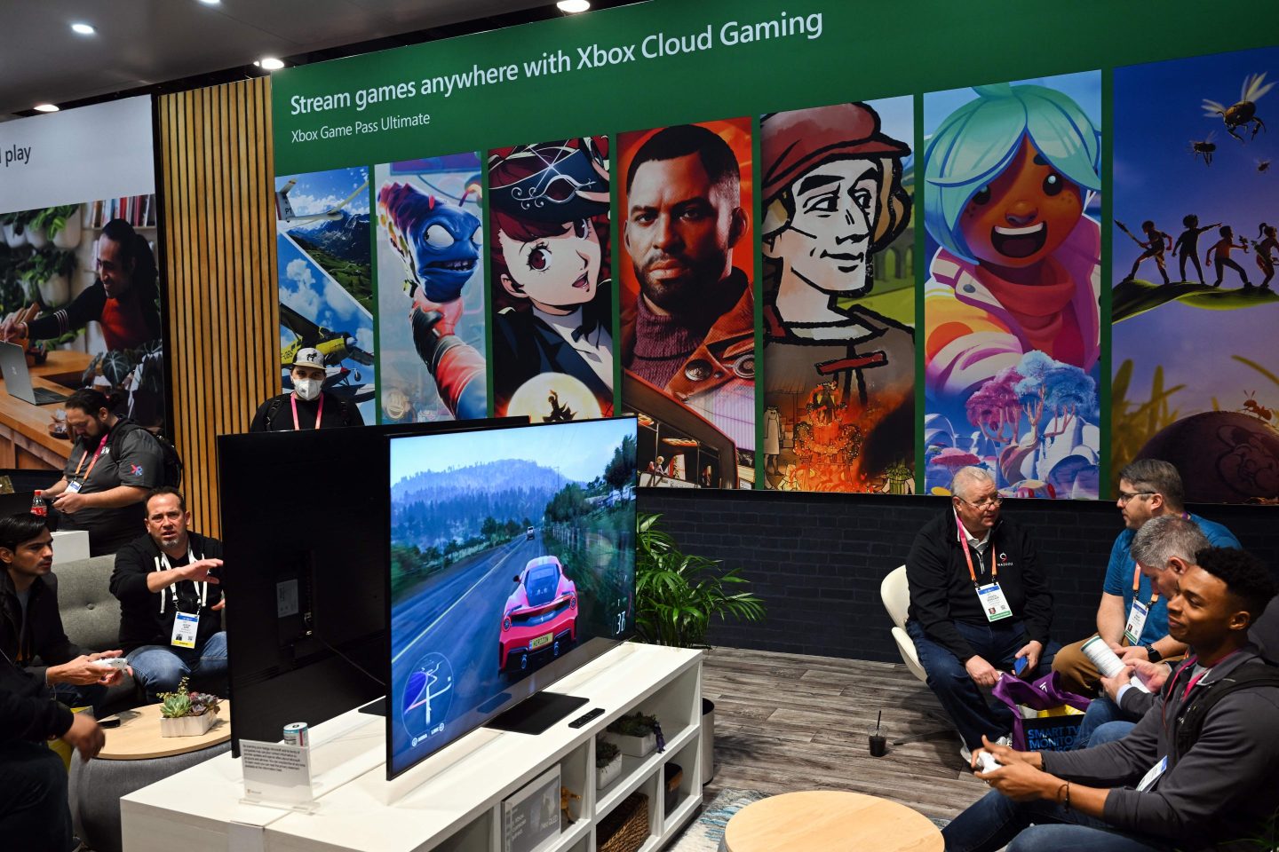 Attendees play video games via Xbox cloud gaming at the Microsoft Inc. booth during the Consumer Electronics Show (CES) in Las Vegas on Jan. 6, 2023.