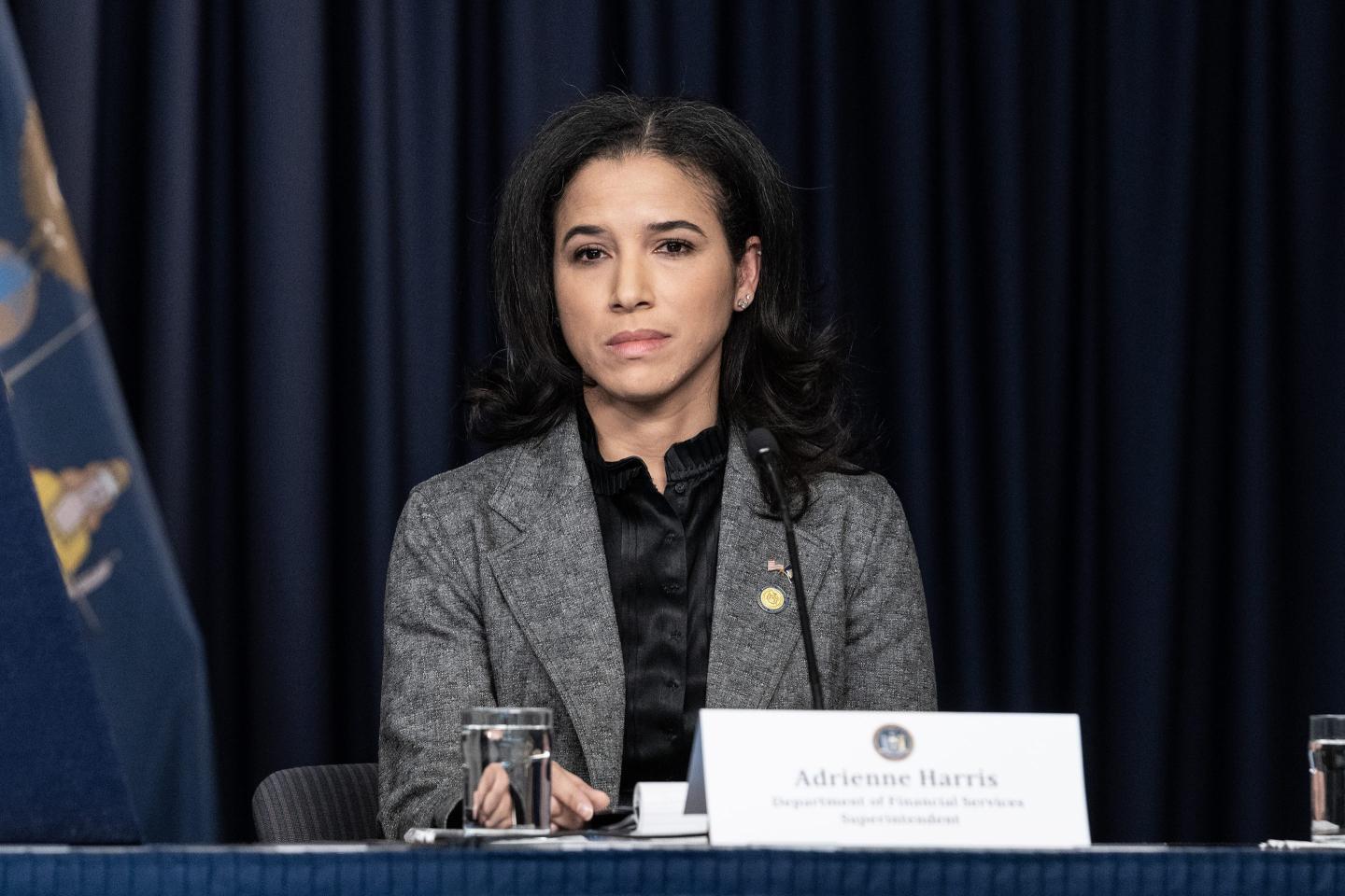 DFS superintendent Adrienne Harris has reached a settlement with Genesis. 