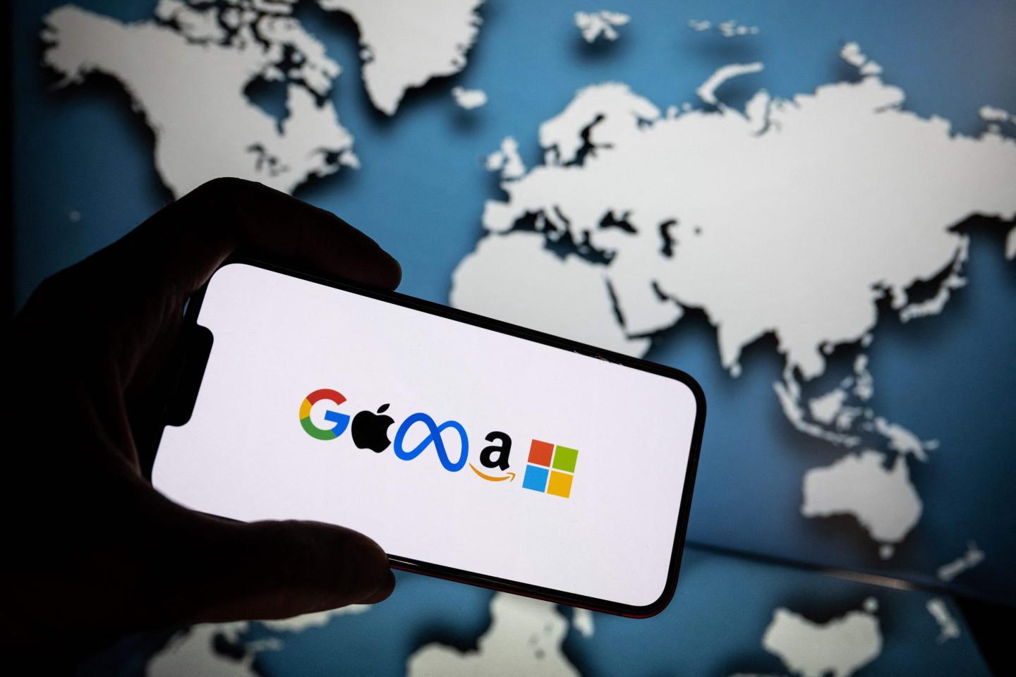 A picture shows logos of the main communication brand also named GAFAM (for Google, Apple, Facebook, Amazon and Microsoft)