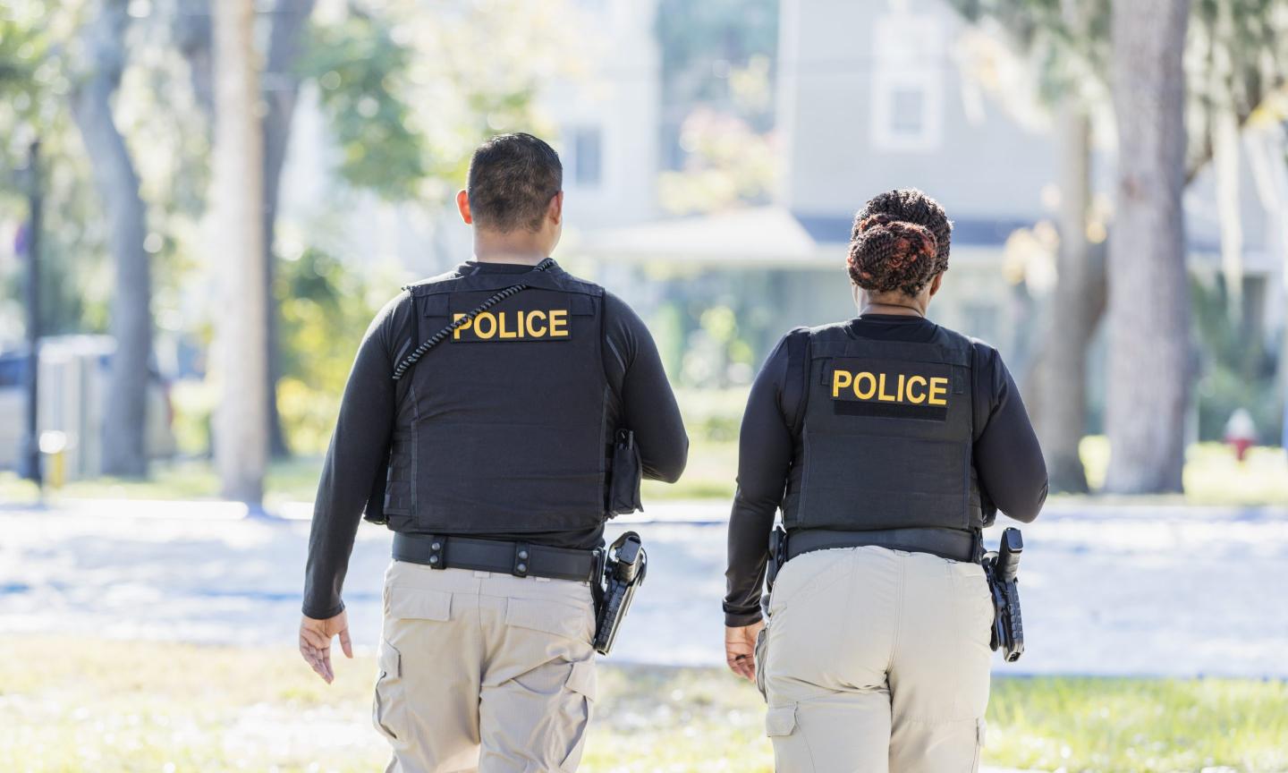 Two police officers walking