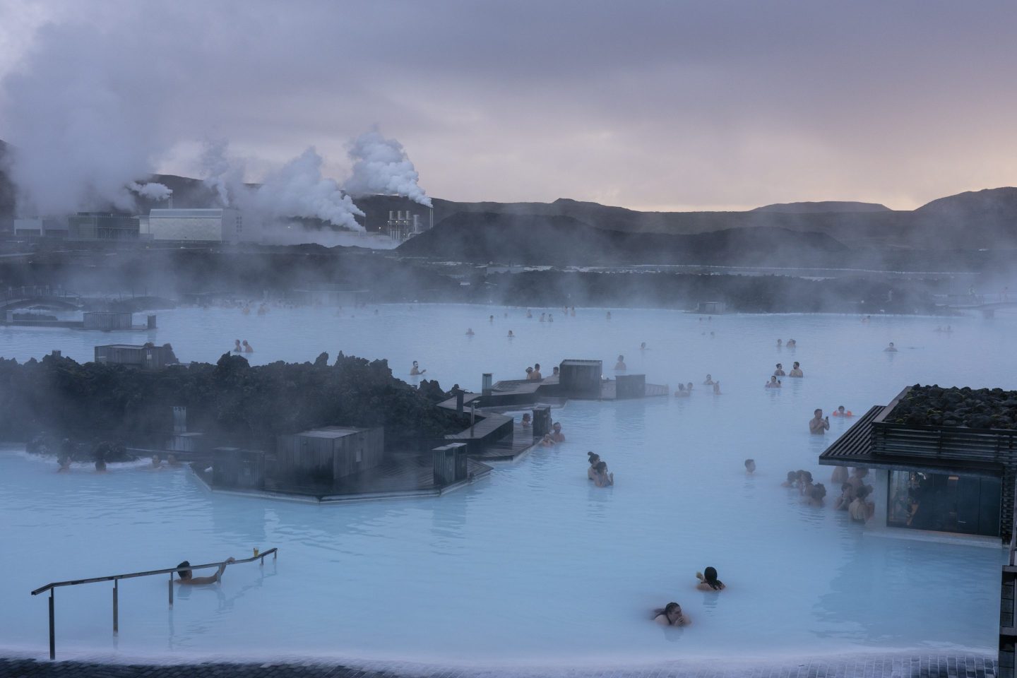 a crowd of people at iceland's hot springs
