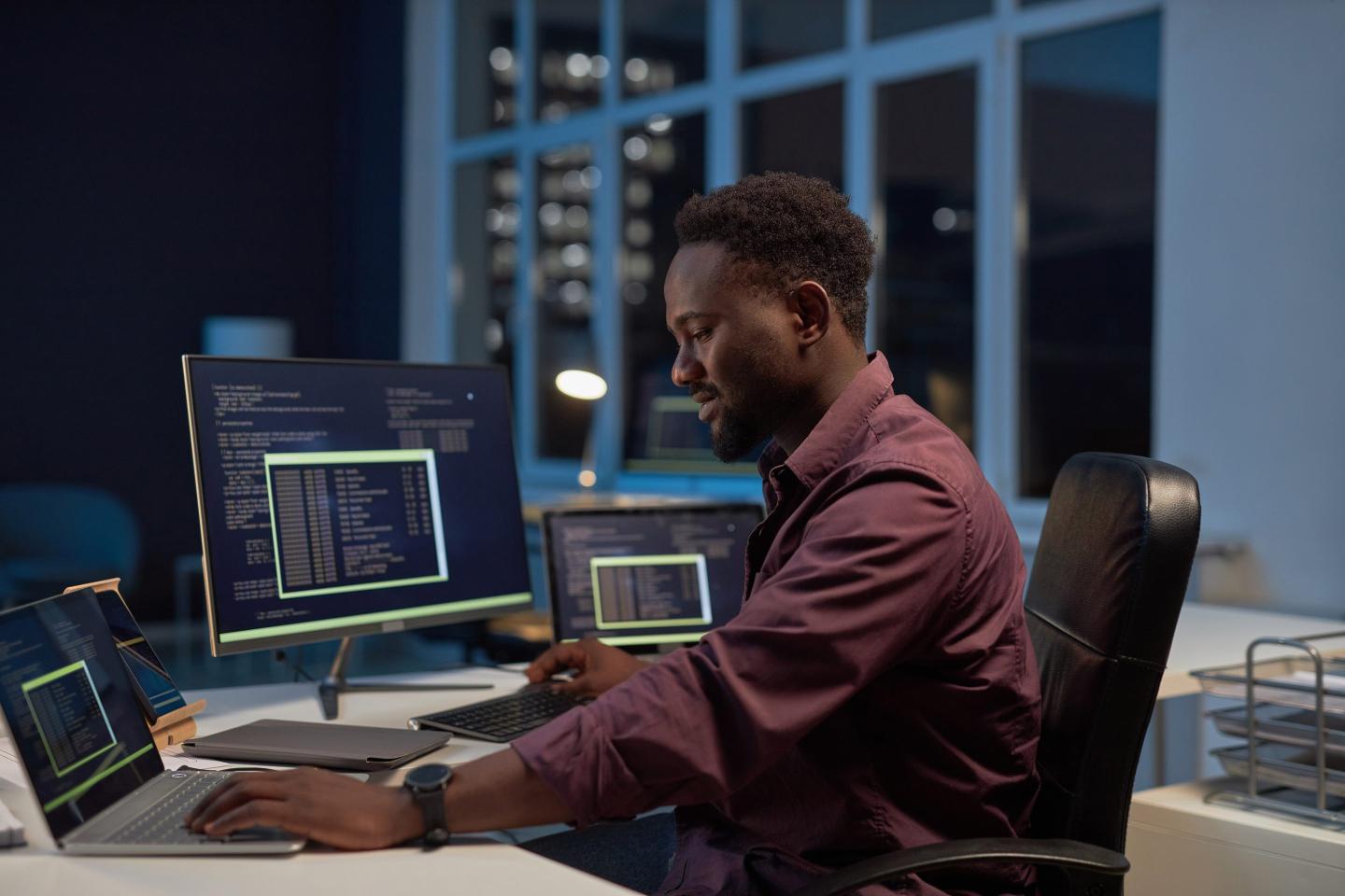 Developer developing software on computer