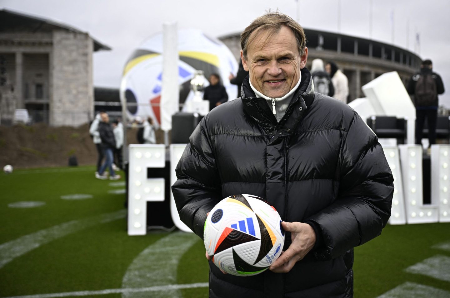 Bjorn Gulden, CEO of sports equipment maker Adidas, holds the official UEFA European Football Championship ball on Nov. 15, 2023 at the Olympic Stadium in Berlin.