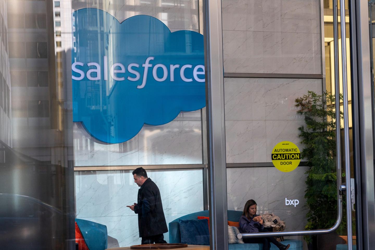 Person walking out of Salesforce headquarters