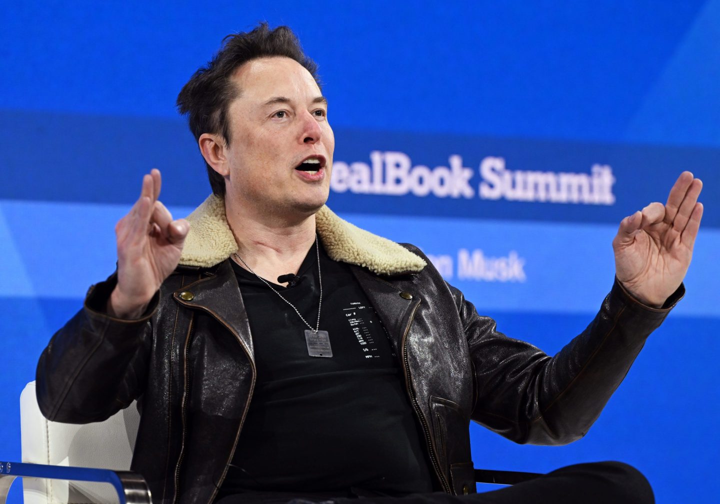 Elon Musk speaks at The New York Times Dealbook Summit on Nov. 29.