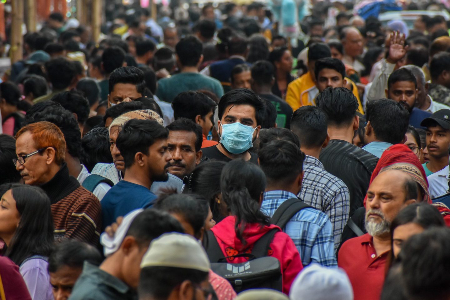 People wearing masks amidst rising concerns about the new, highly mutated COVID variant JN.1, as seen in Kolkata, India, on Dec. 27, 2023. BA.2.86, a close ancestor of JN.1, may cause more severe disease, according to two new studies published Monday.