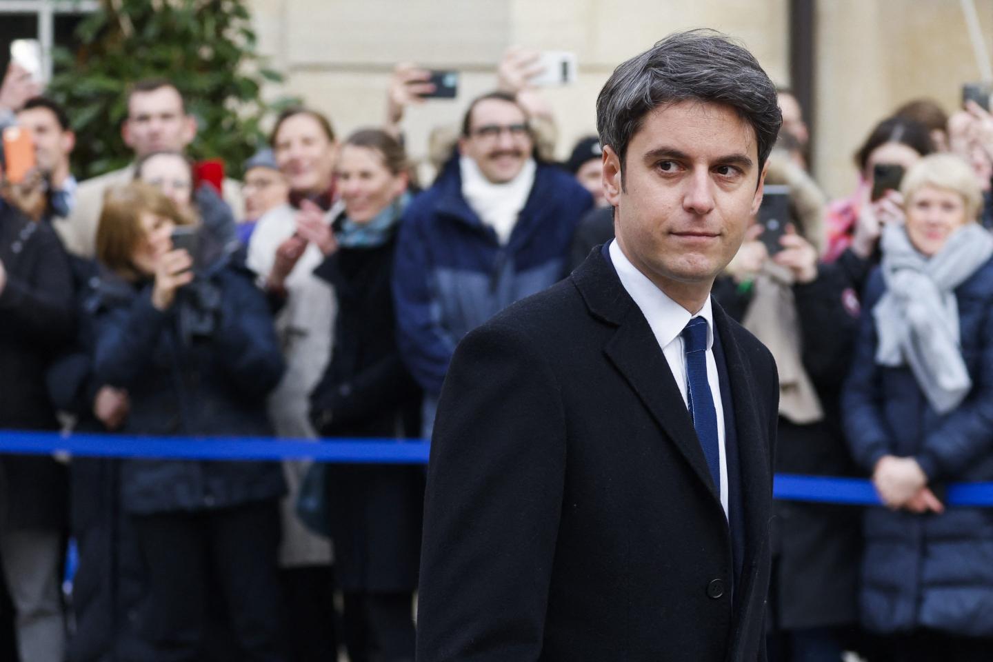 Newly appointed Prime minister Gabriel Attal arrives for the handover ceremony with outgoing Prime minister at the Hotel Matignon in Paris, on January 9, 2024.