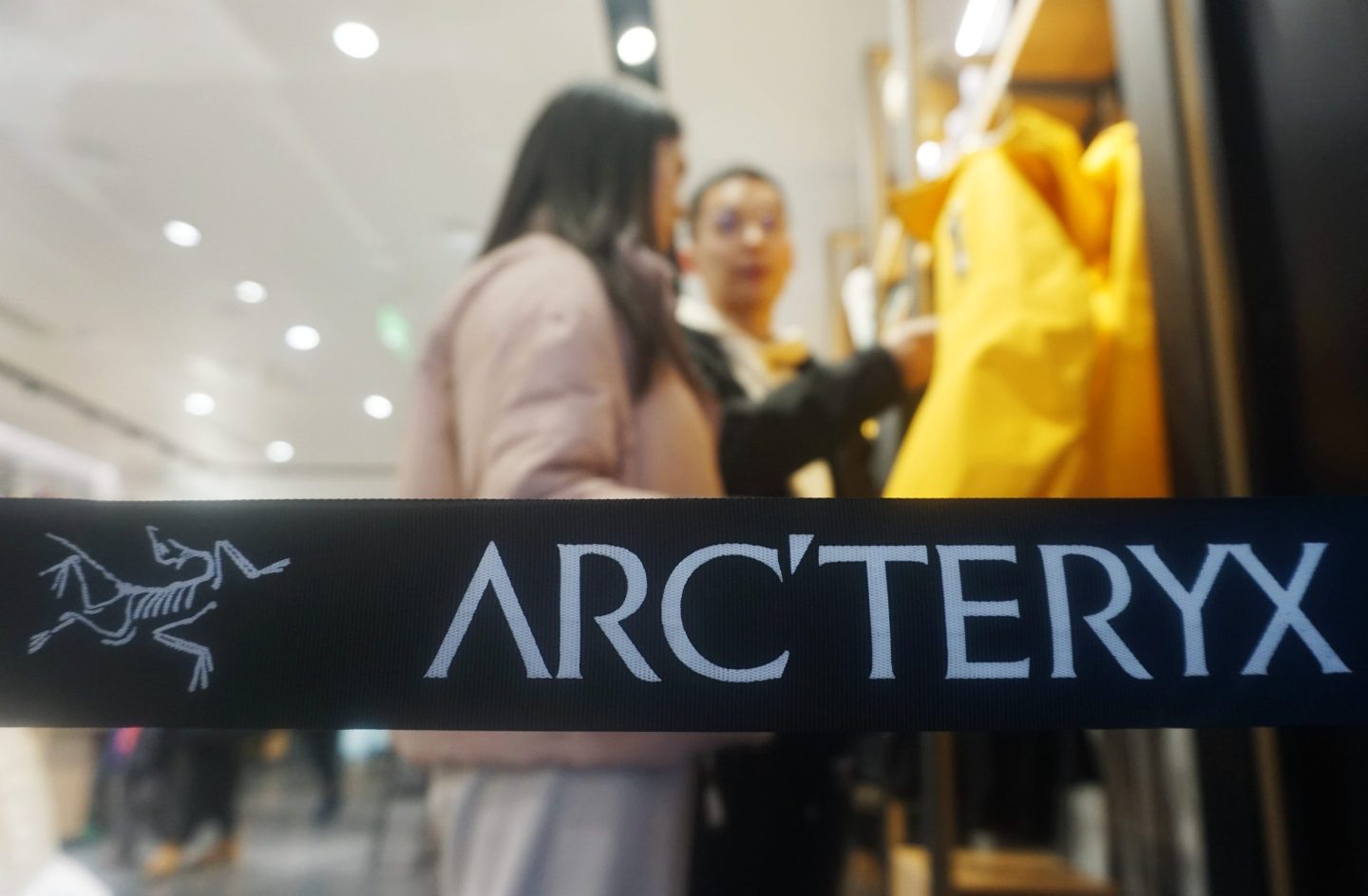 Customers at an Arc'teryx store in Hangzhou, China, on January 13, 2024, demonstrate strong demand for Amer Sports' goods.