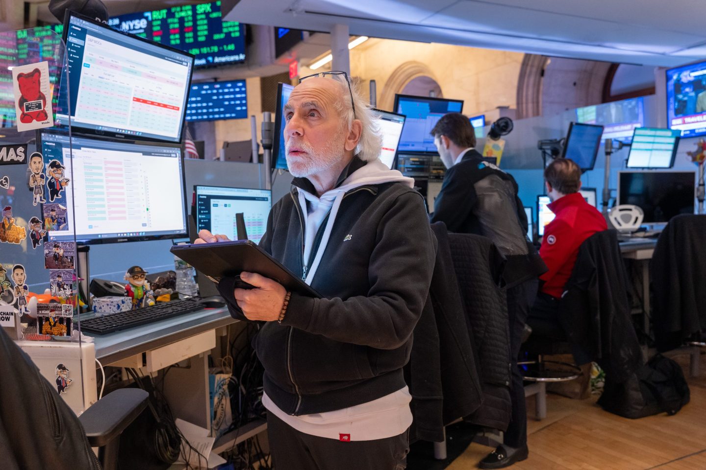 Traders work on the floor of the New York Stock Exchange (NYSE) on January 19, 2024 in New York City.