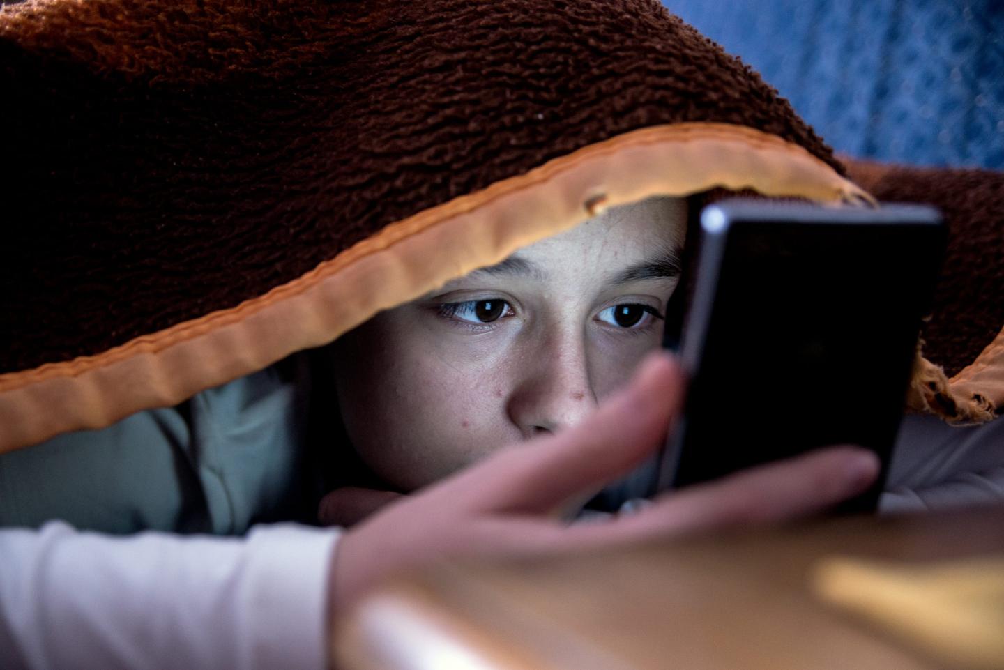 Kid on phone