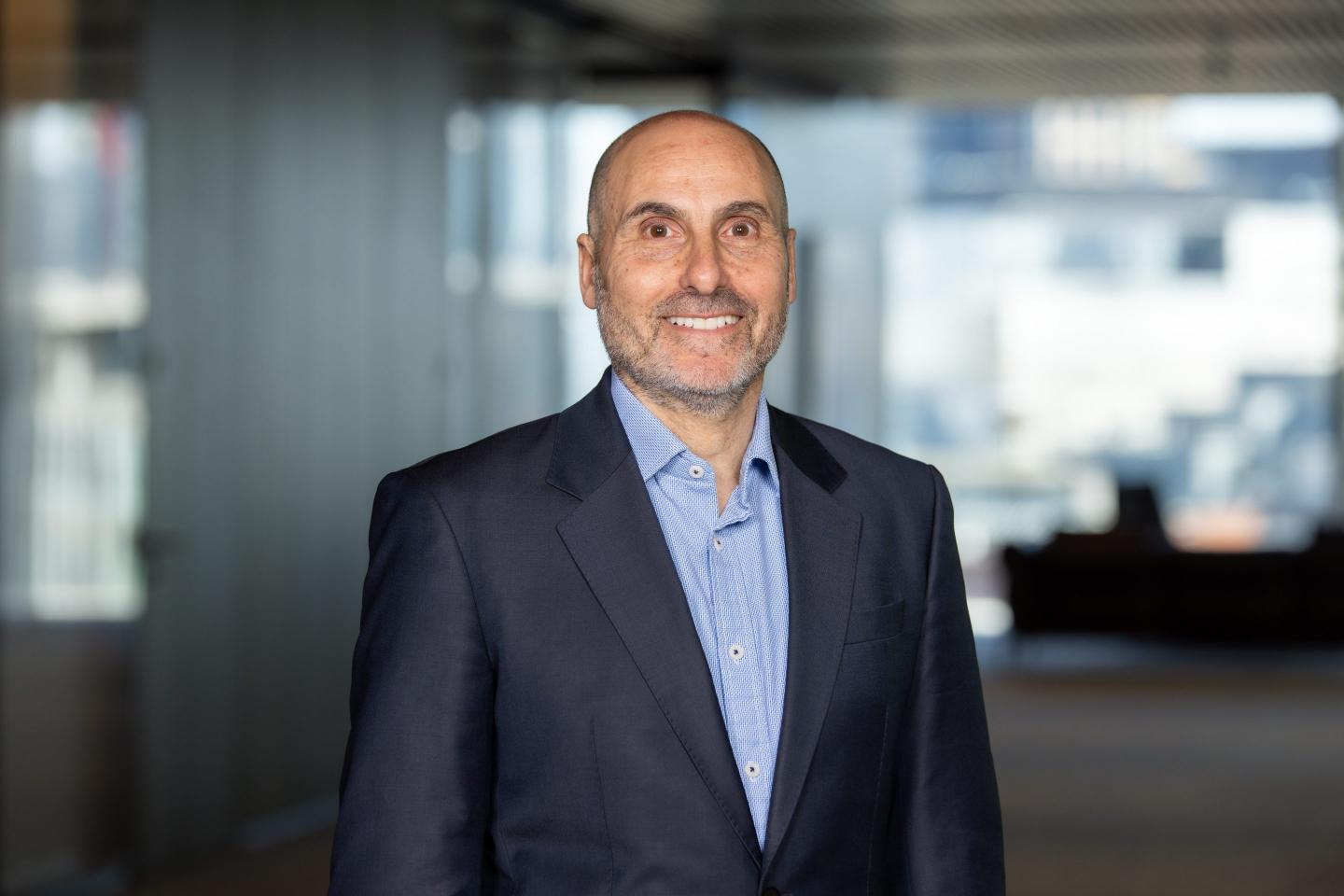 Goldman’s strategy guru says we’ve begun a rocky ‘post-modern’ cycle in the world economy—and AI could save the day from raging conflict, higher rates, and surging deficits