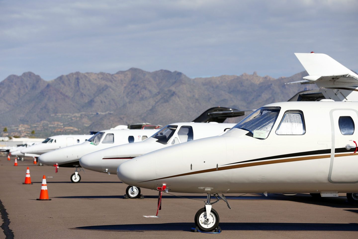 Private jets sit parked at Scottsdale Airport on Jan. 27, 2015, in Scottsdale, Ariz. 