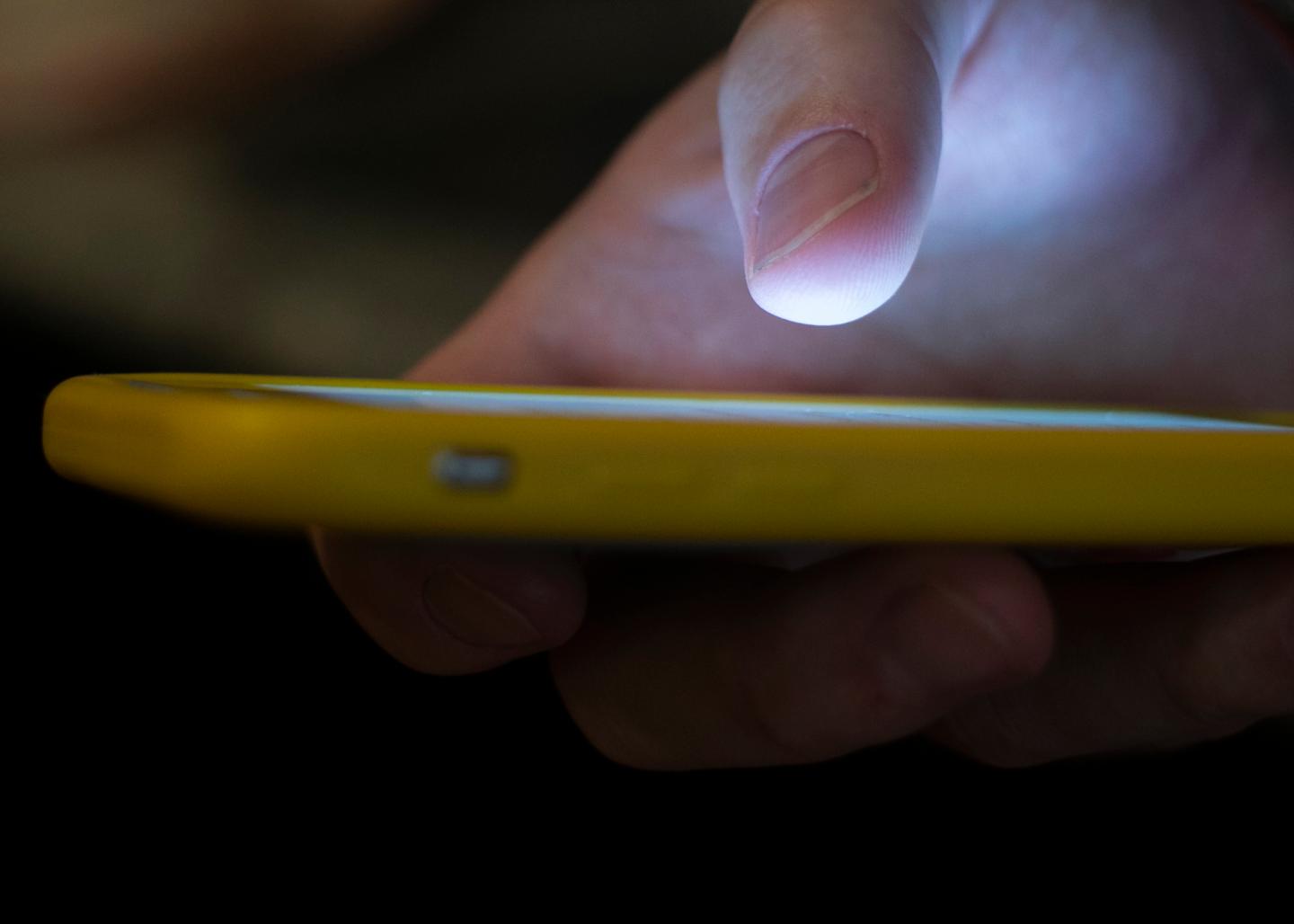 Person with cell phone